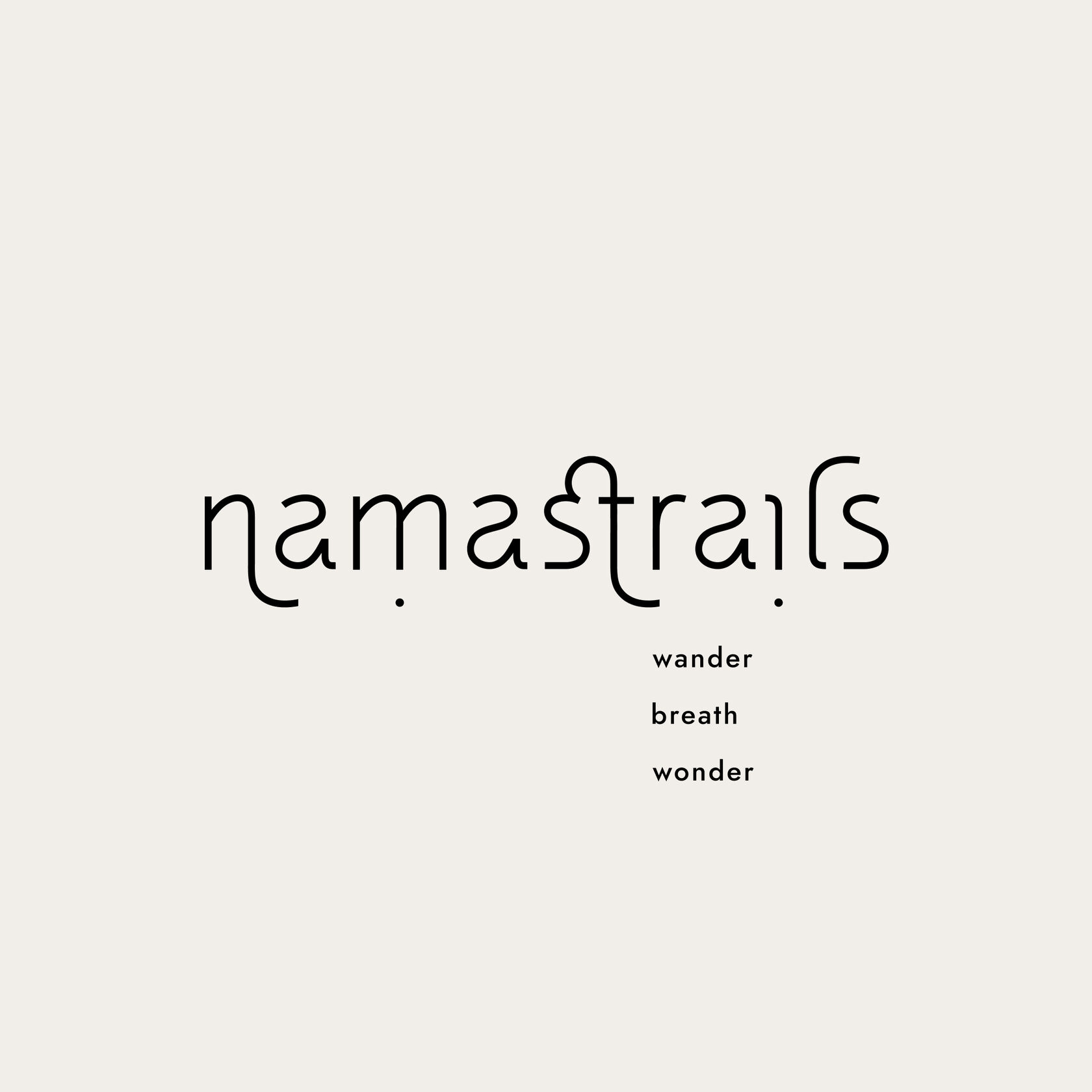 Minimalist and organic logo for Namastrails, inspired by nature, movement, and spiritual exploration.