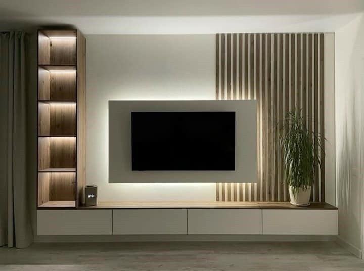Bespoke media wall with TV recess, storage and feature lighting in Peterborough