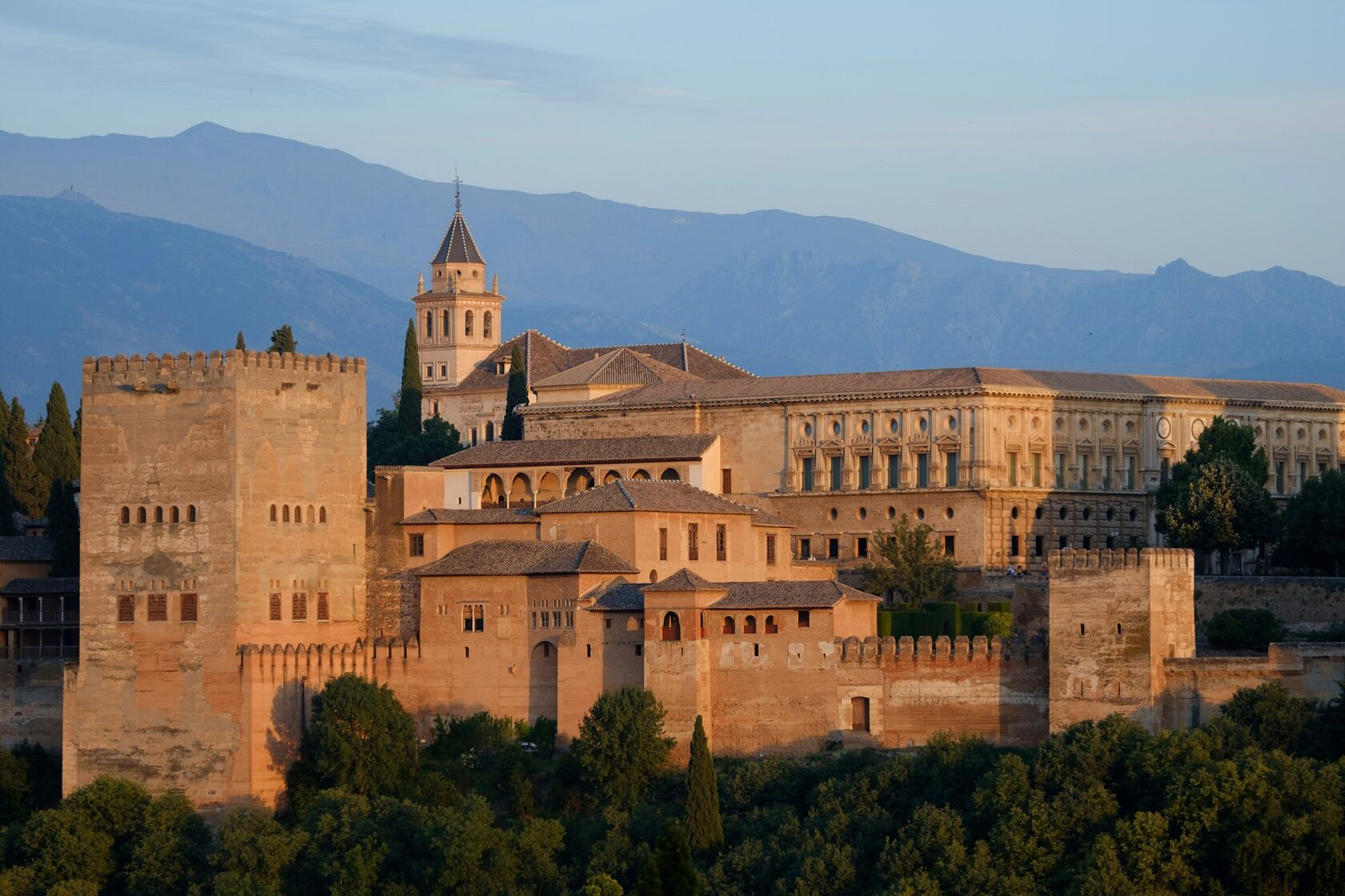 Alhambra Granada at sunset with the Sierra Nevada behind