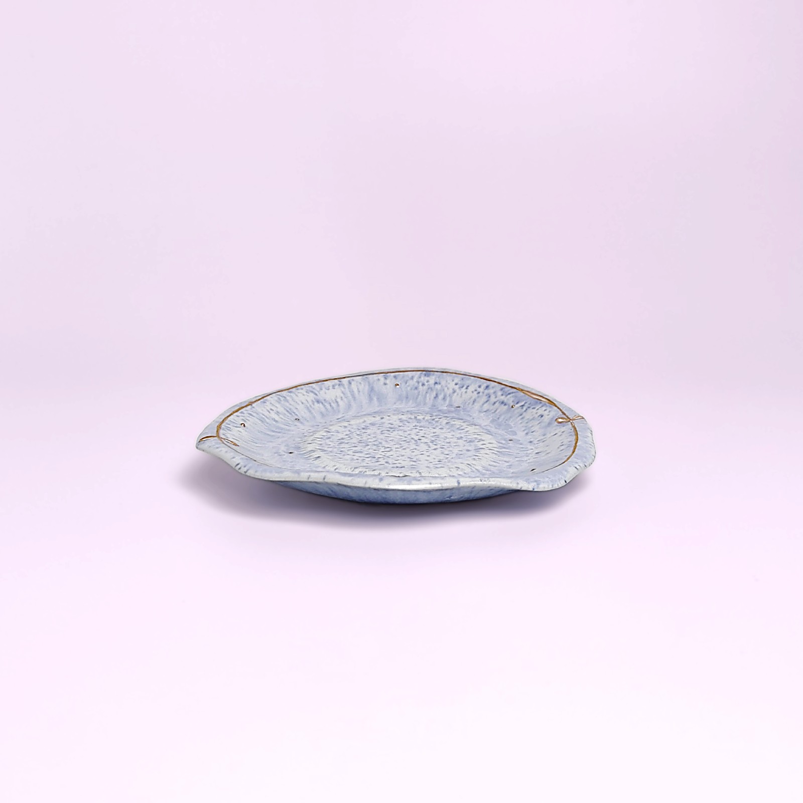 Artistic handmade ceramic cup and saucer in soft blue glaze with a girl medallion — a unique one-of-a-kind piece