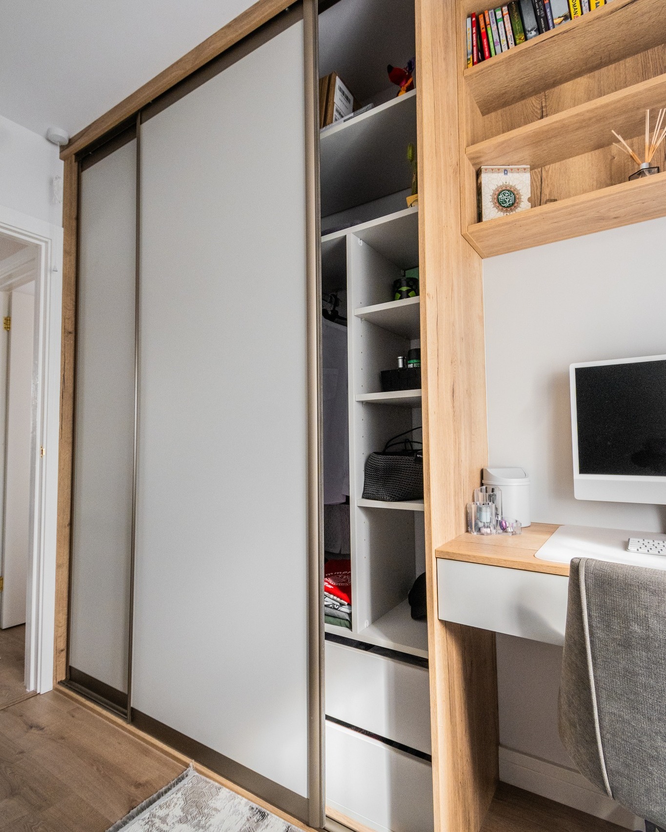 Mirrored sliding wardrobe with integrated lighting