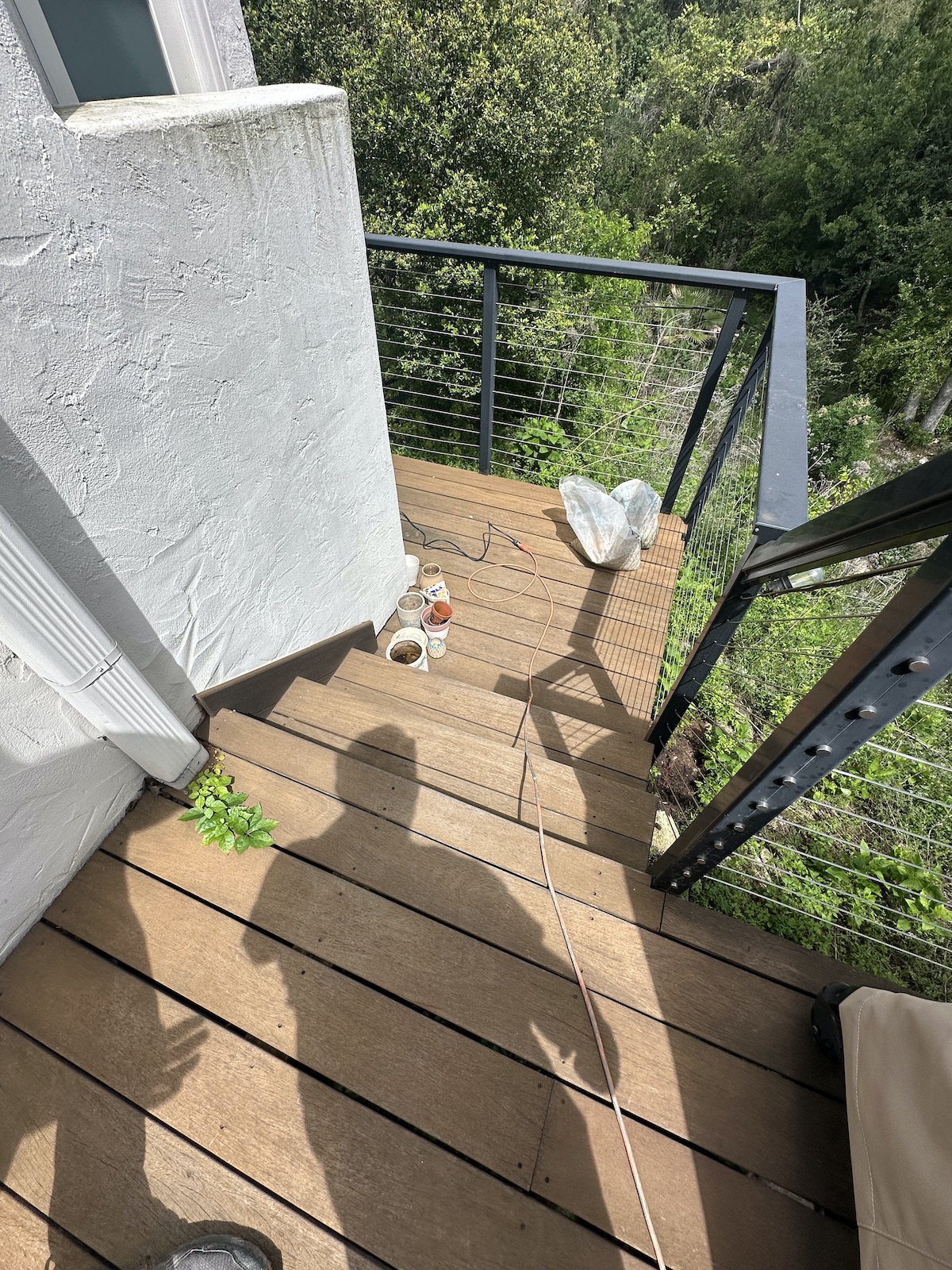 Surface preparation for IPE deck refinishing in Austin area