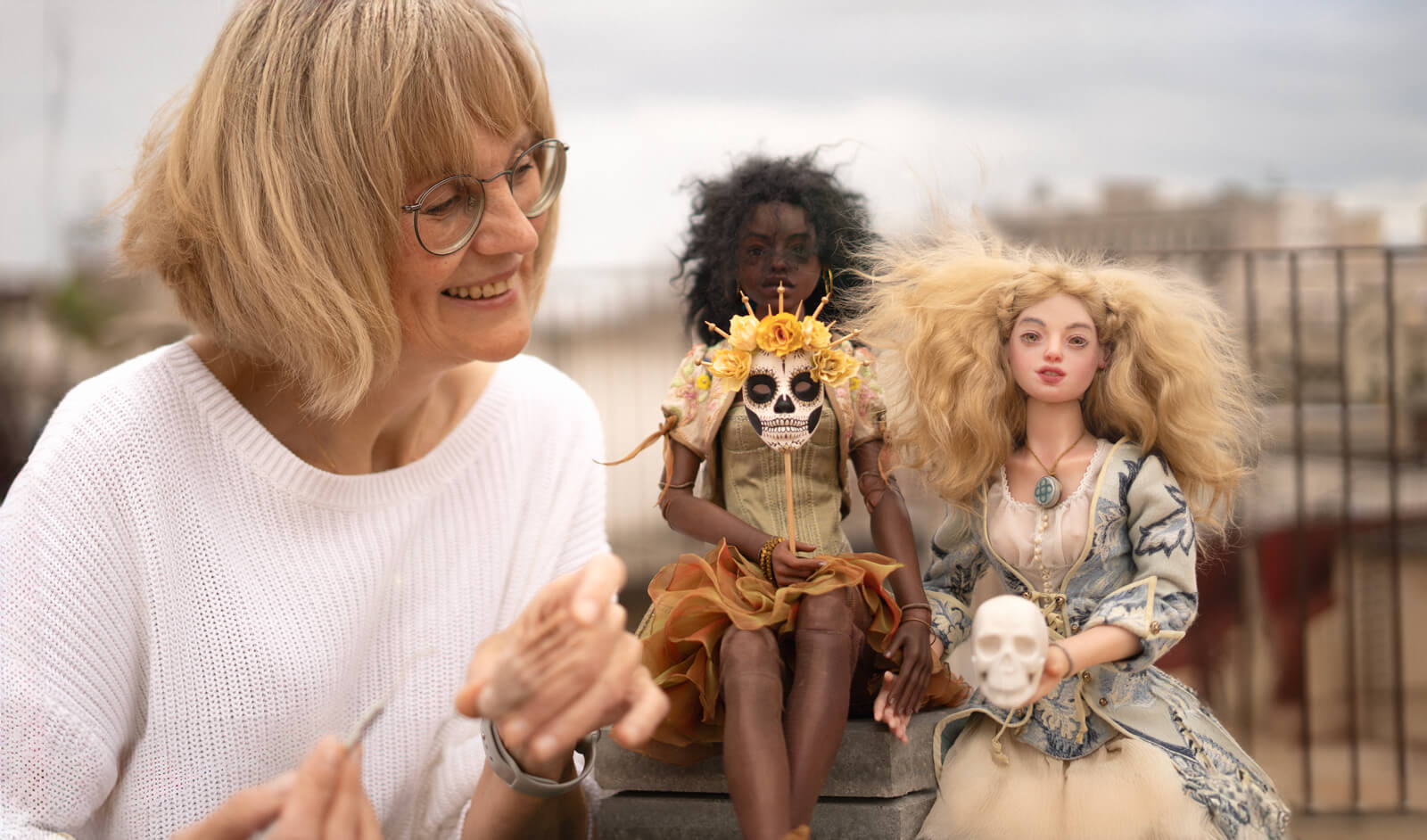 Anna Haritonova, doll artist, on a Barcelona rooftop with her ball-jointed dolls