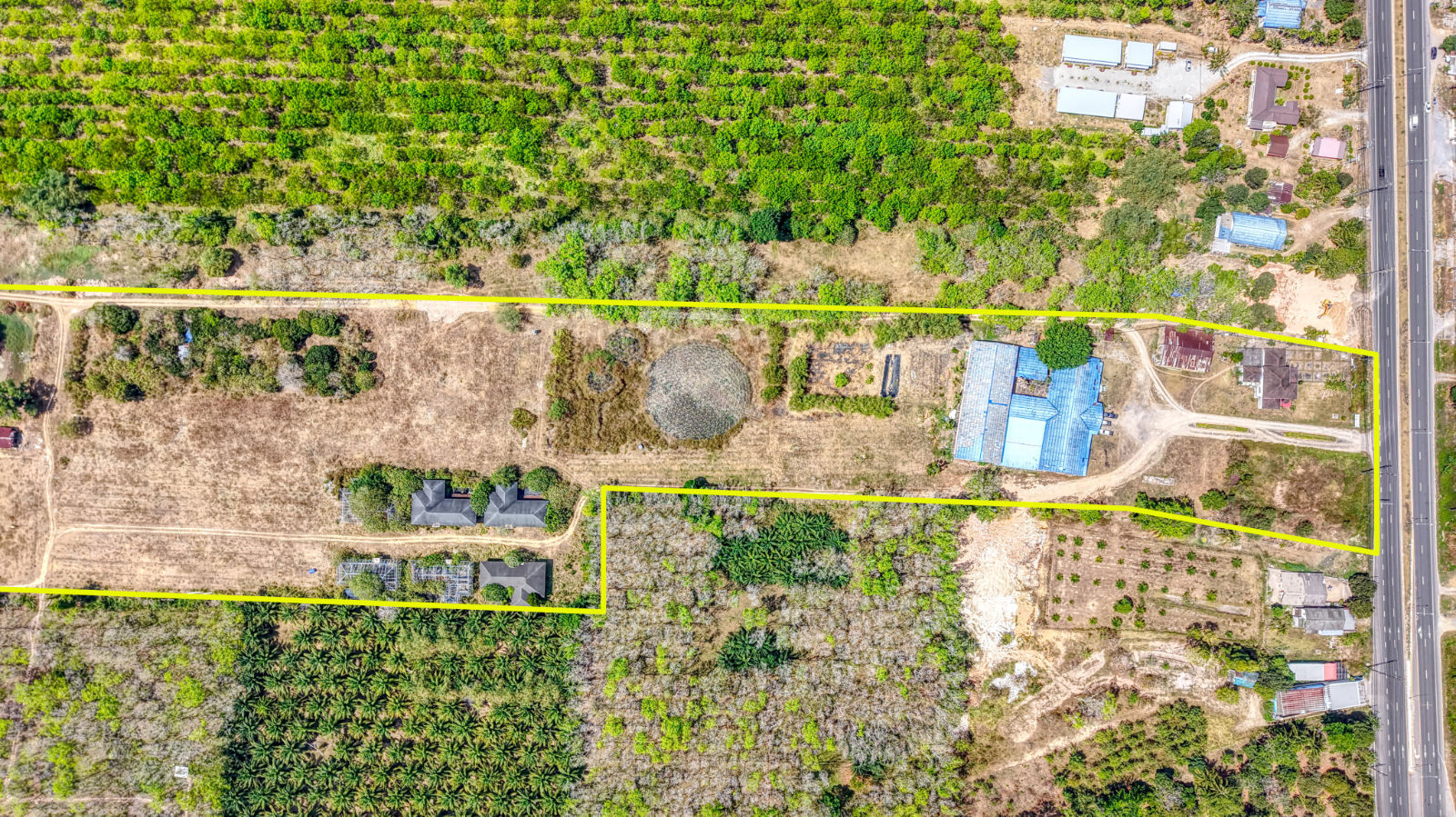 Aerial view showing the plot boundary, 62 rai near Natai Beach