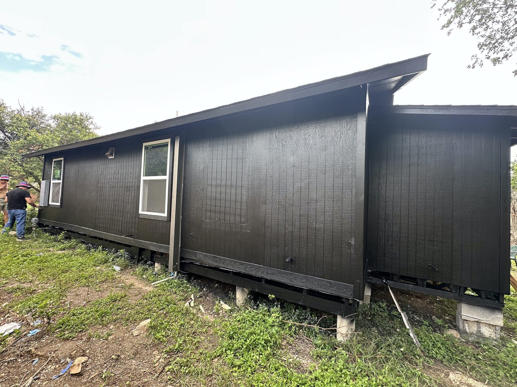 Painted exterior · Side elevation — Austin house flip by Kir Remodeling