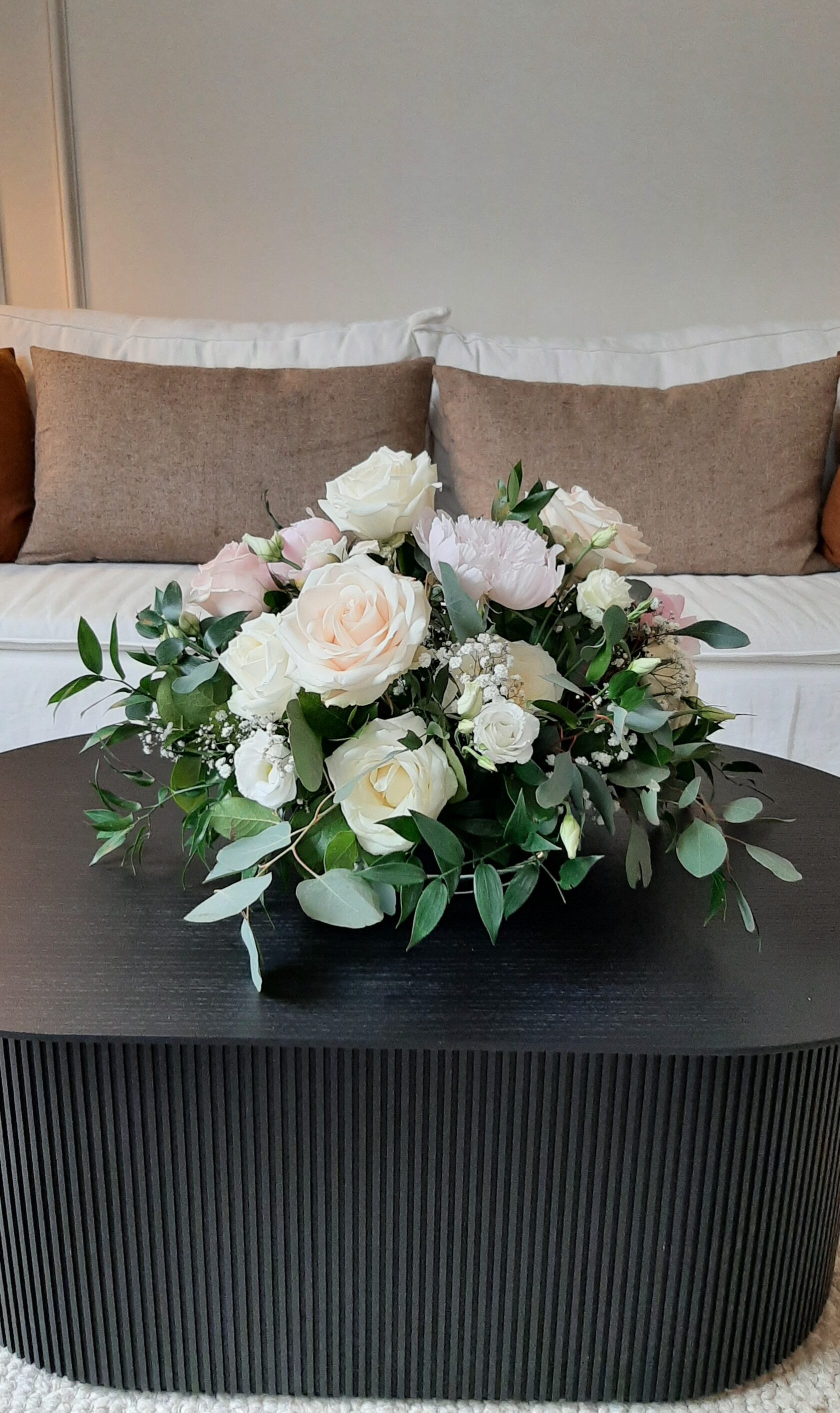 arrangement with roses in pastel tones