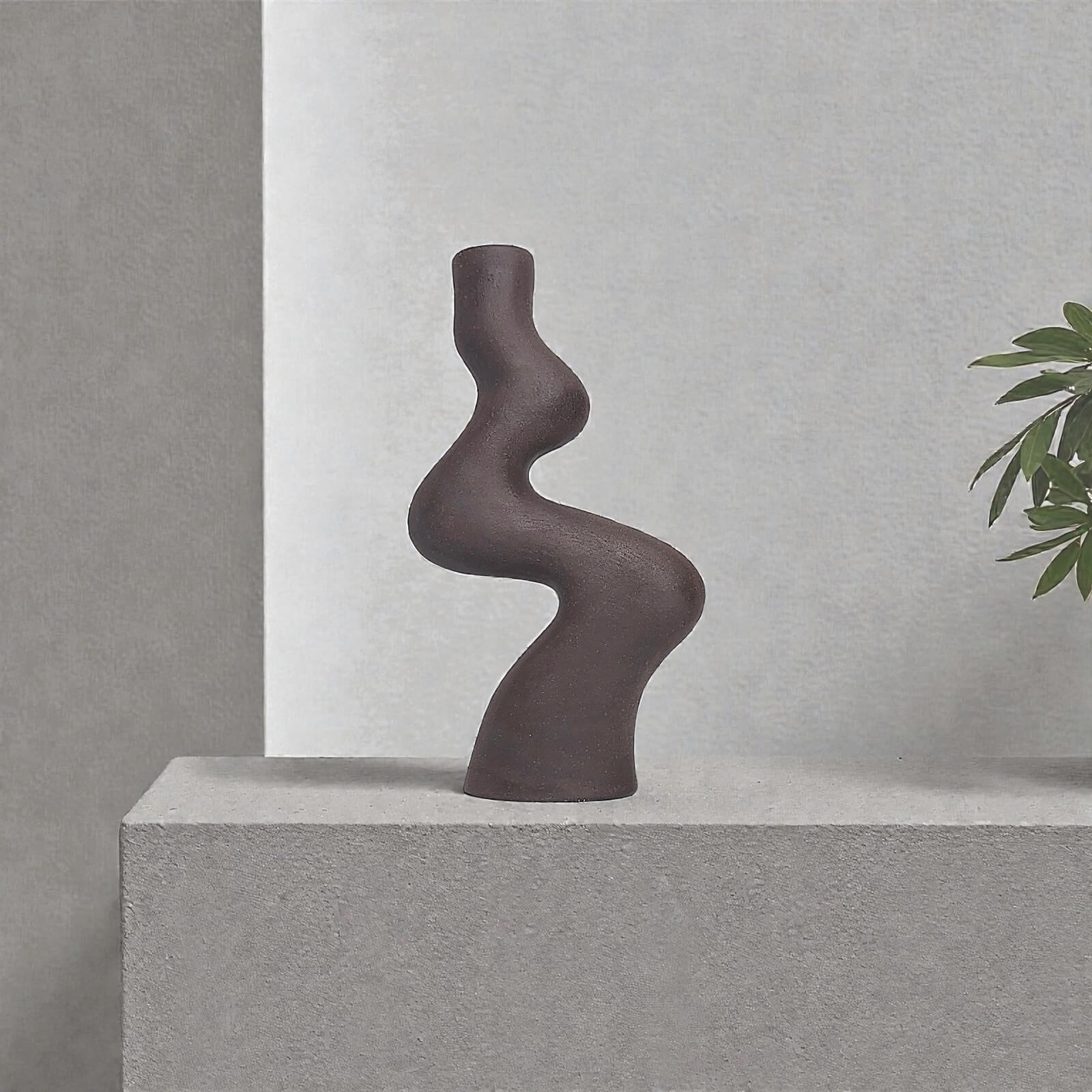 Handmade ceramic candle holder, wavy shape, dark brown color, matte finish, unique artisan decor piece