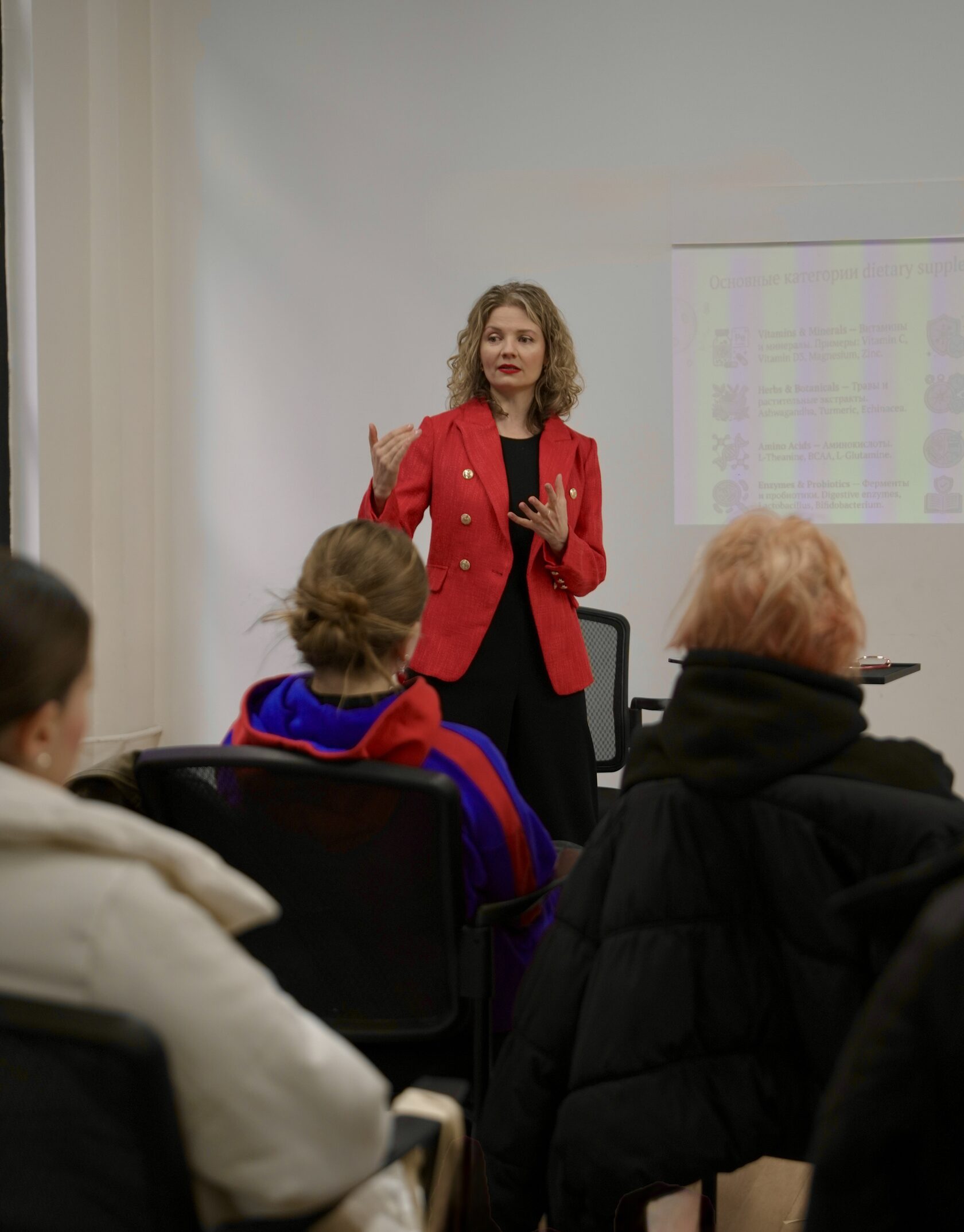 Anastasiia teaching a nutrition workshop