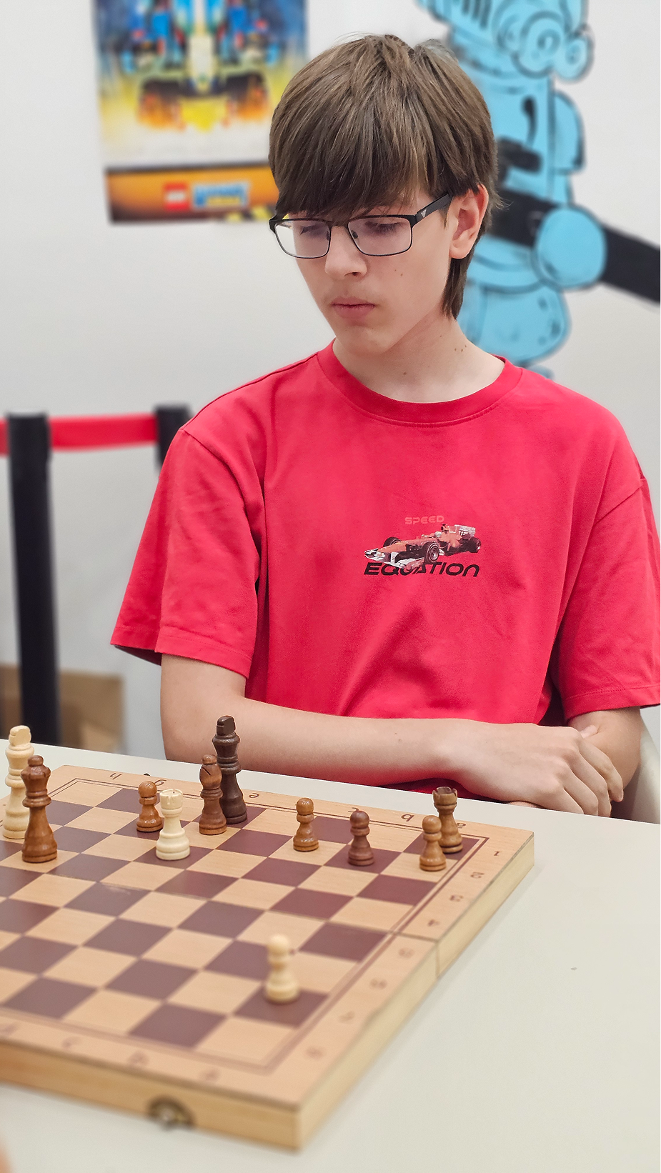 Student at the advanced chess level during a training game