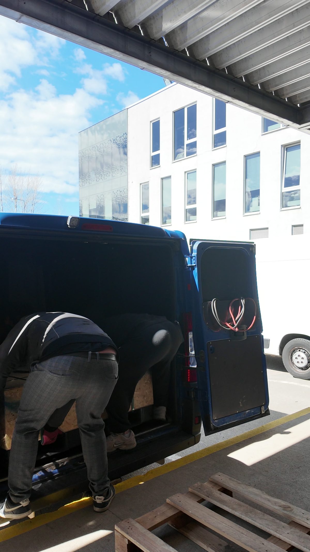 Crates being moved out of the Cutlab workshop