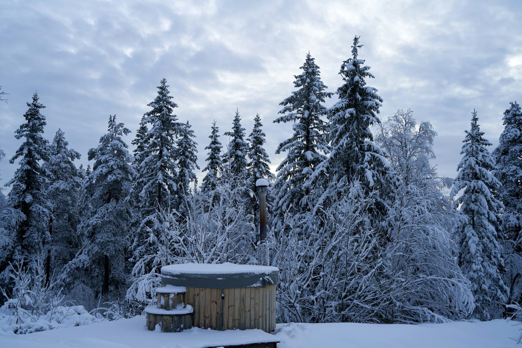 Outdoor hot tub in snow