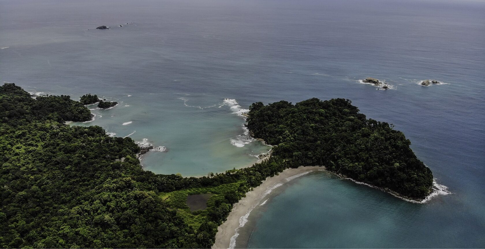 Aerial view of the Manuel Antonio coastline below Makanda by the Sea, Costa Rica