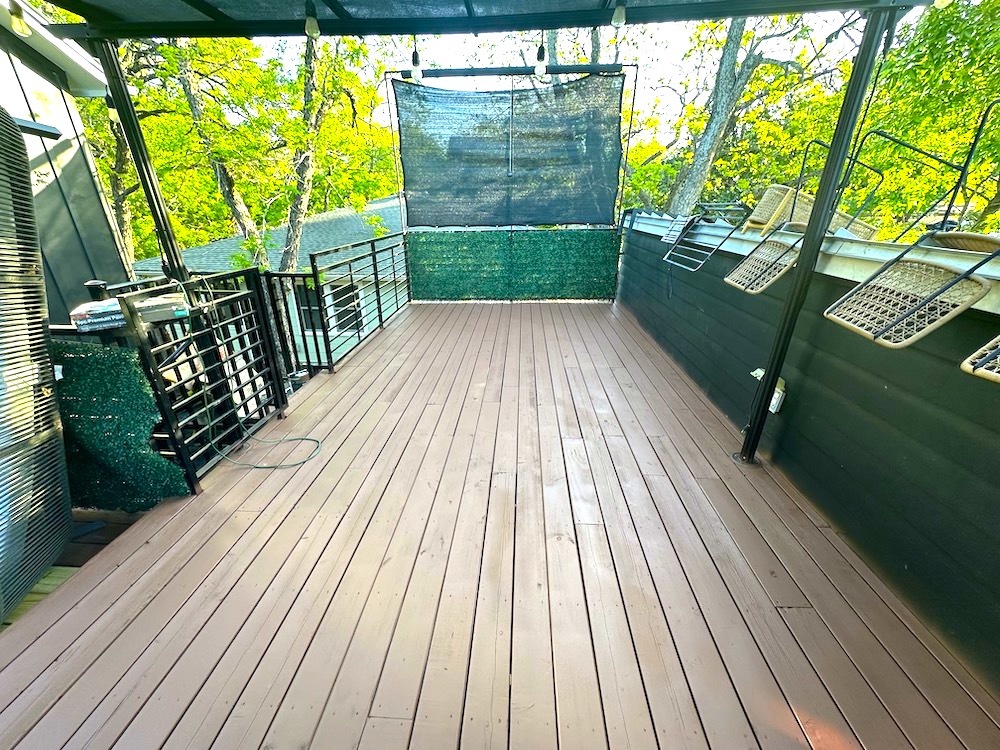 Wood terrace floor repaired and painted in Austin TX