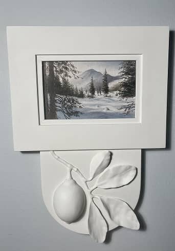Decorative white frame with carved lemon branch on the bottom 
