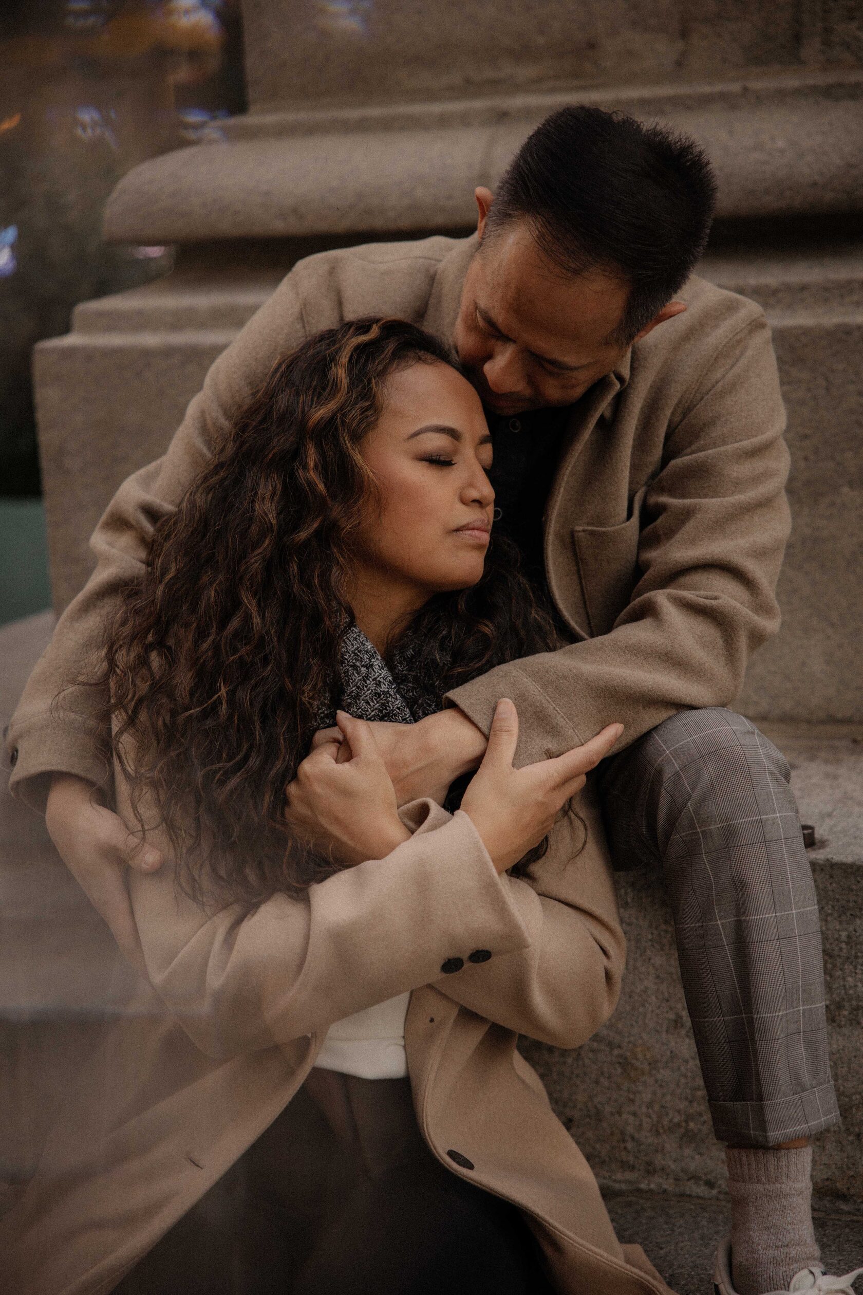 Engagement couple kiss