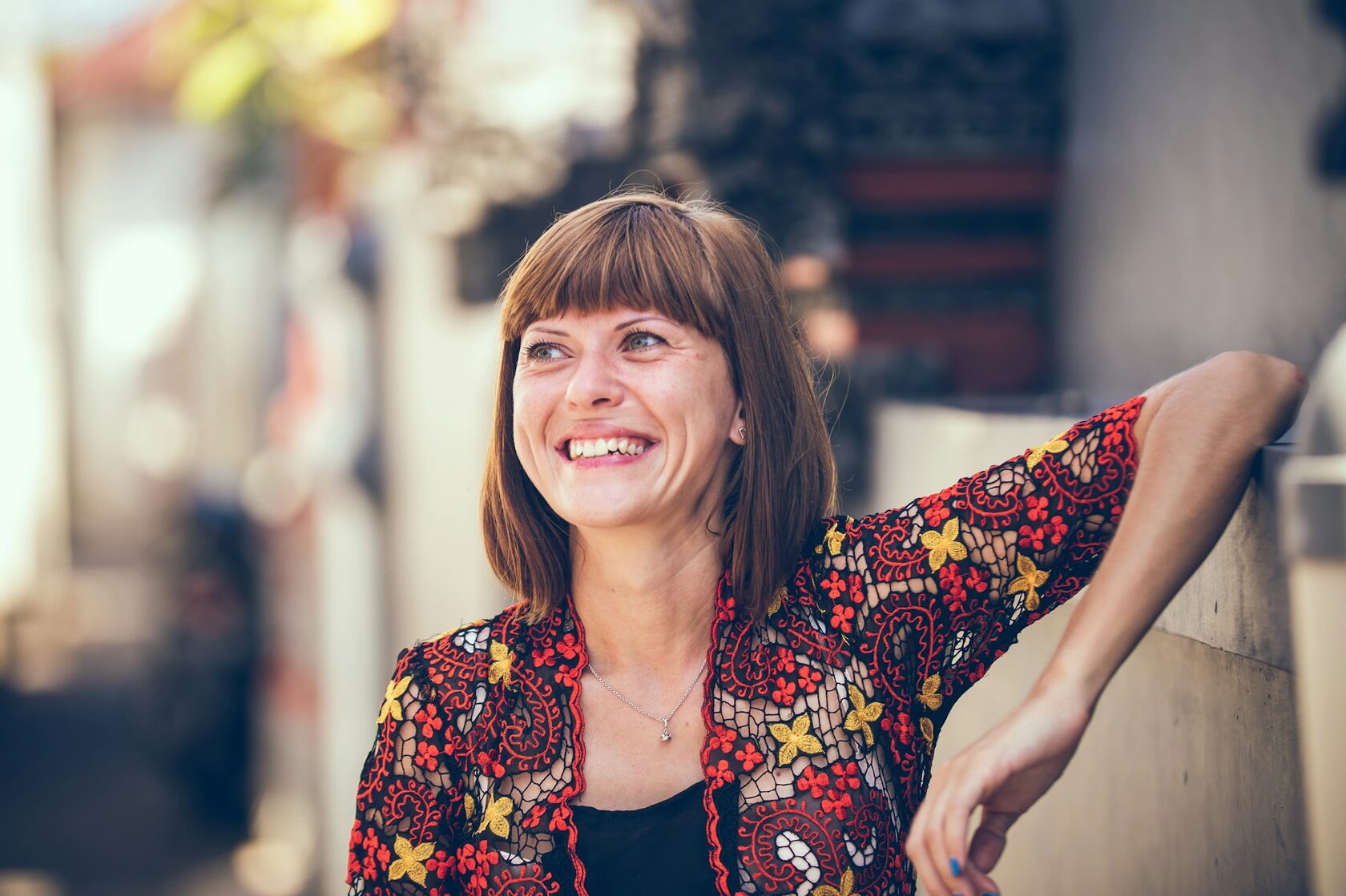 Portrait of Saoirse, a Namara tour director, smiling outdoors