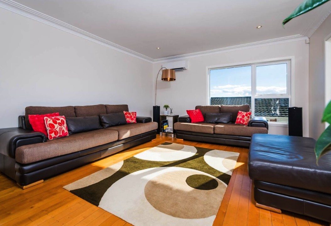 Before: compact Glenfield living room with two couches