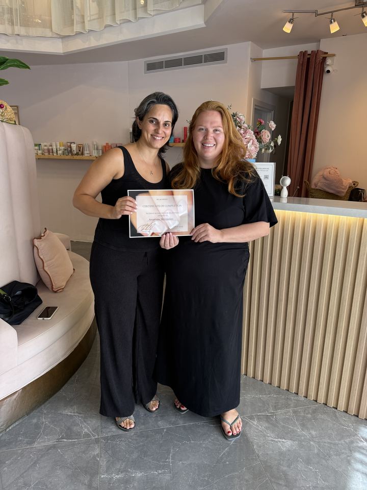 Graduate with her certificate and Nina