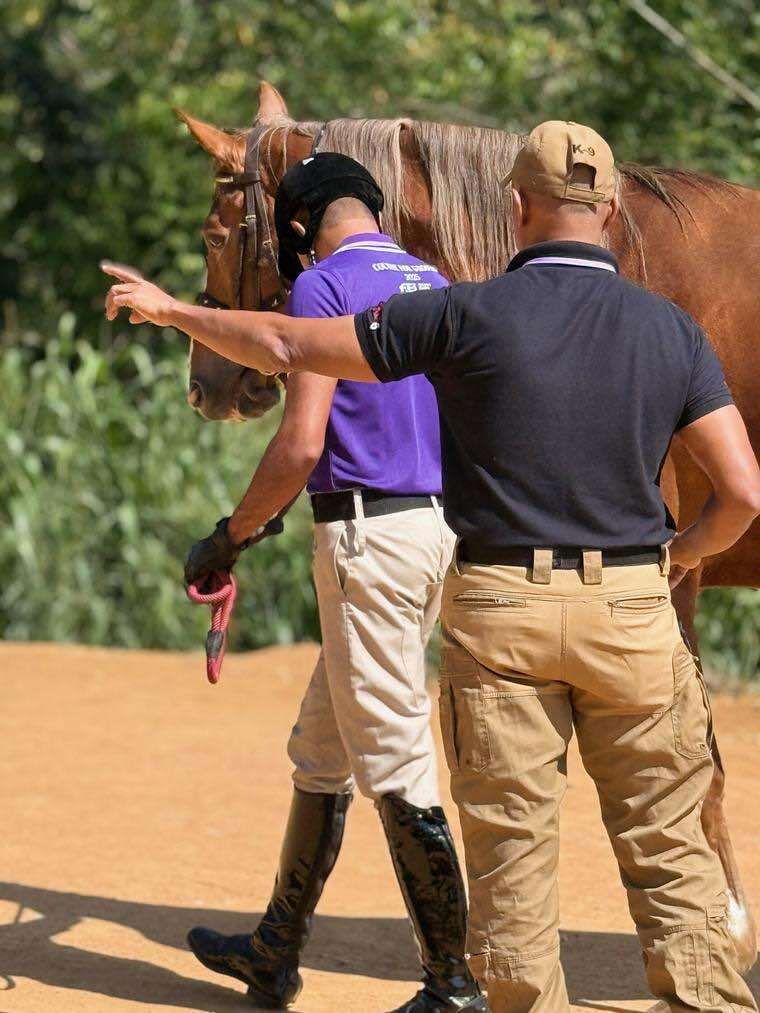 Horsemanship instructor coaching a student during practical groundwork with a horse at Vonfidel Ranch