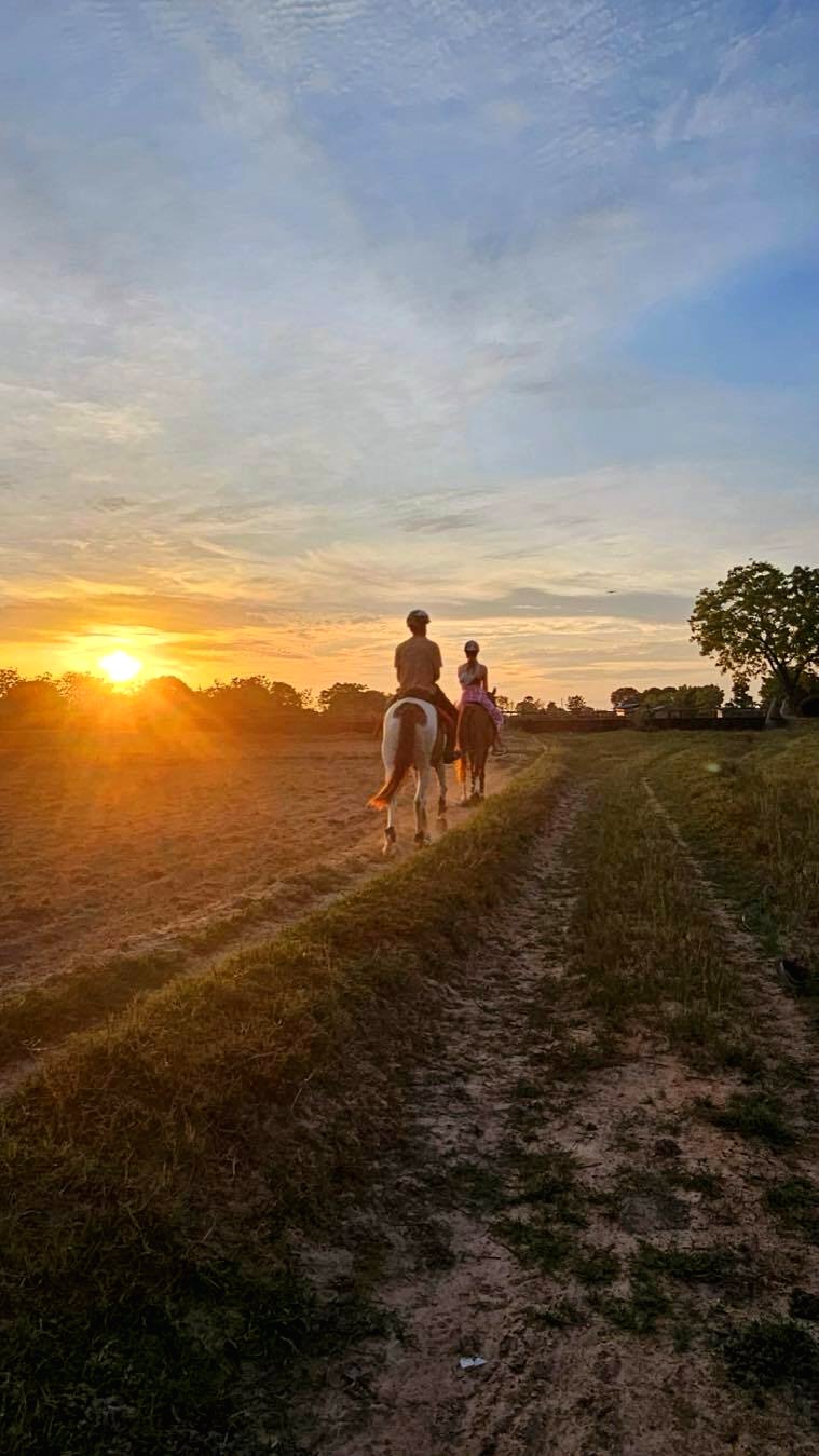 Riders moving at sunset during a low-volume Vonfidel Ranch riding holiday in Sri Lanka
