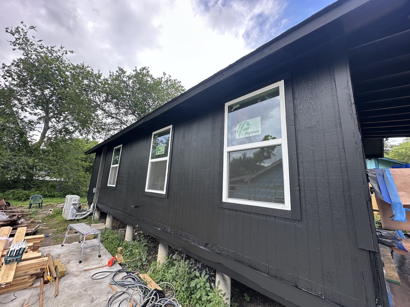 Painted exterior · House and covered porch — Austin house flip by Kir Remodeling