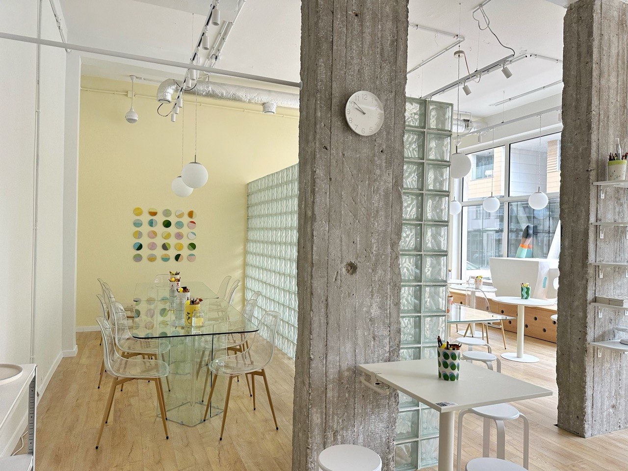 The Glass Room at Create Cafe Warsaw — a glass table, transparent chairs and a glass-block wall