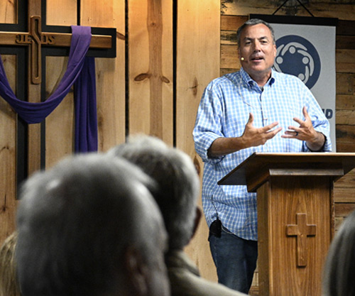 Pastor expounding the scriptures from the pulpit