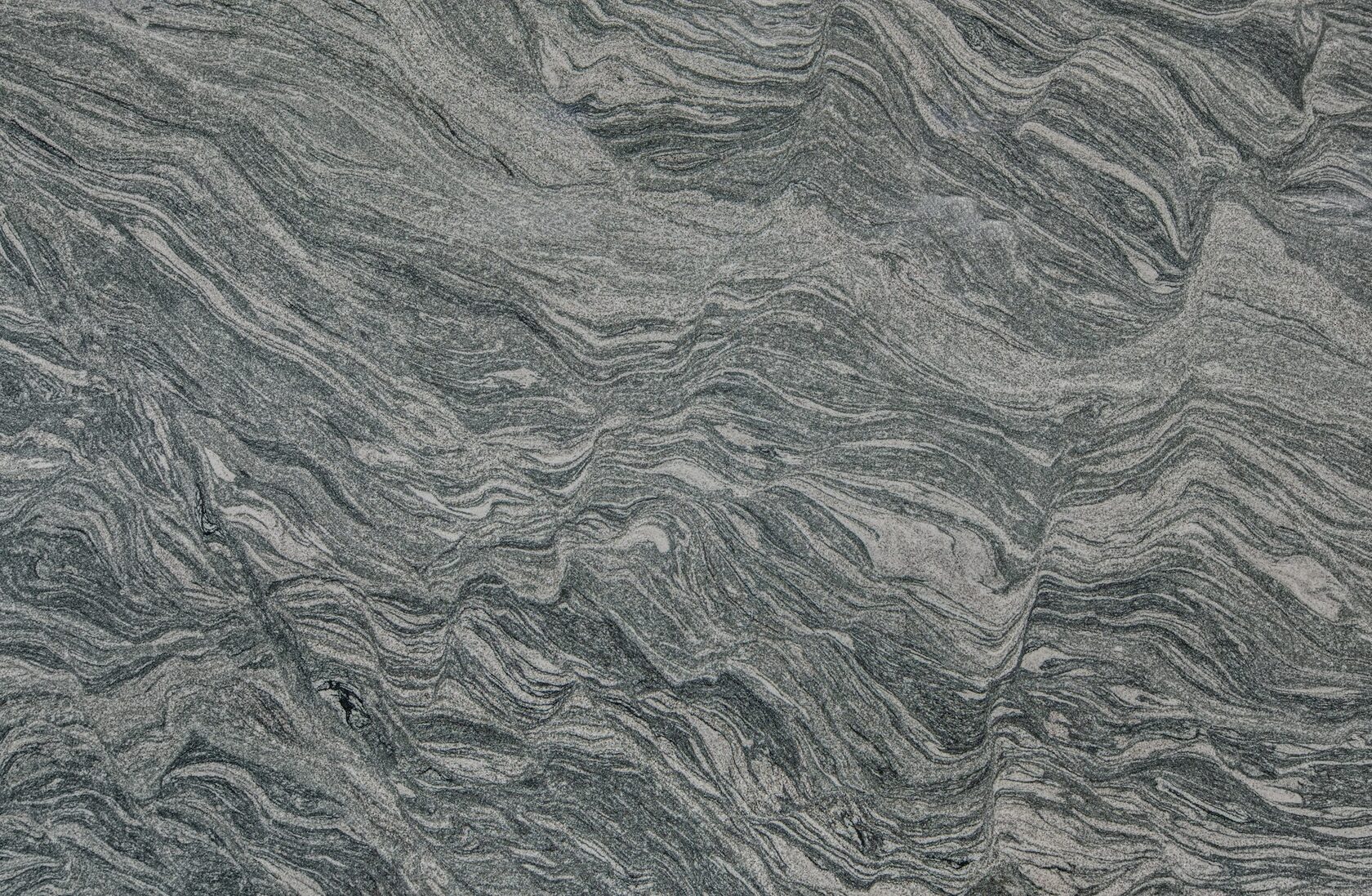 Textura de granito natural en tonos oscuros