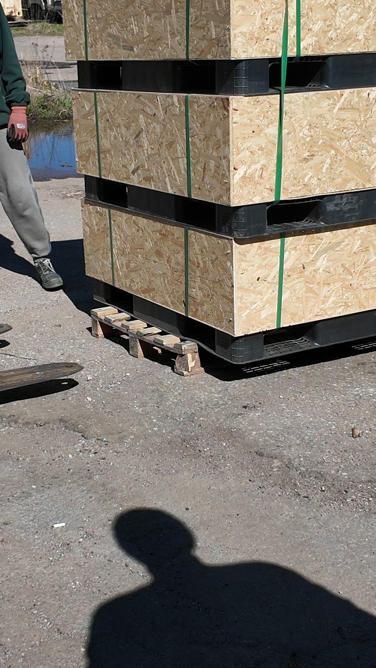 Packed crates stacked on pallets, ready for shipping