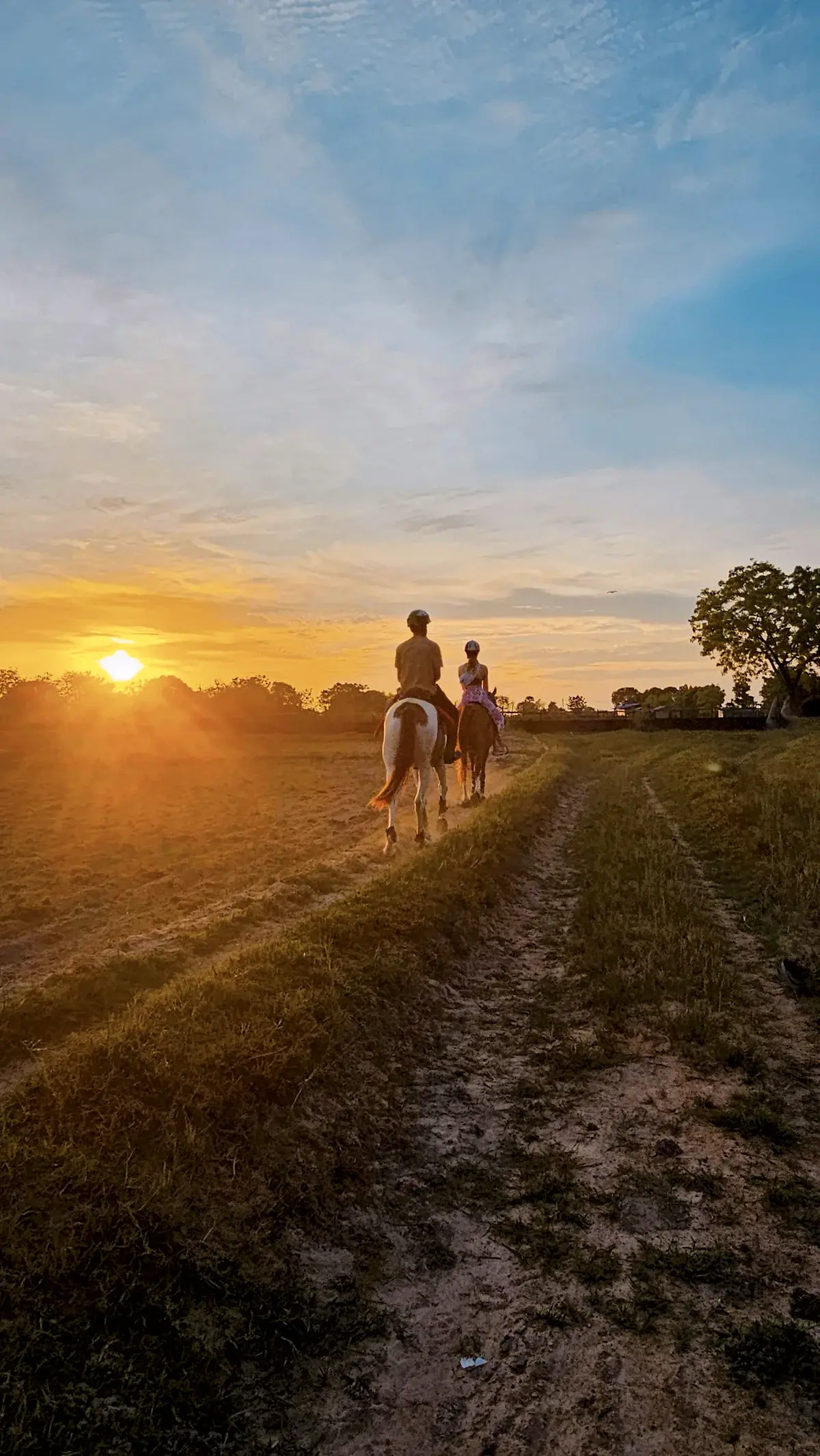 Riders moving at sunset during a low-volume ride at Vonfidel Ranch