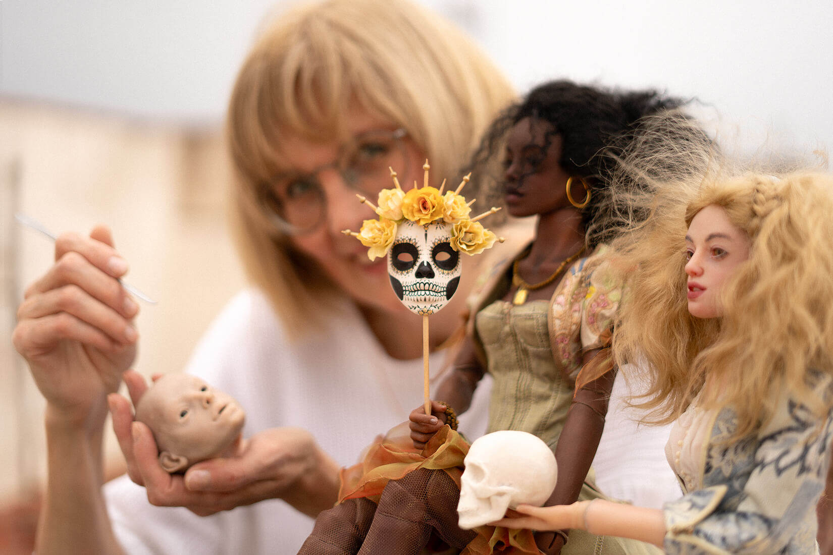 Anna Haritonova with her ball-jointed dolls on the roof