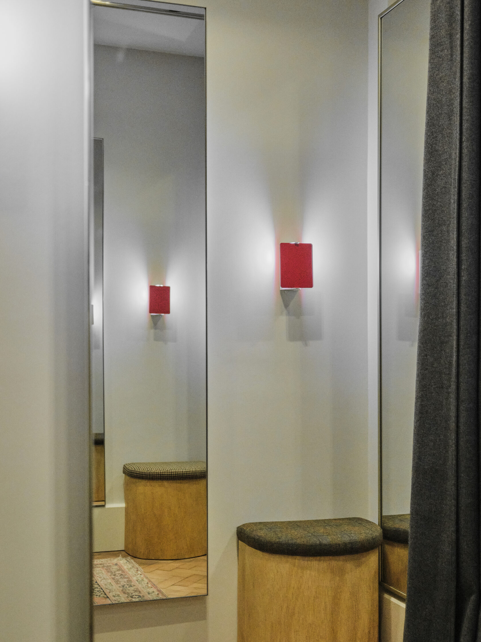 Bespoke joinery and display rails in Drake's Savile Row store, refitted while trading