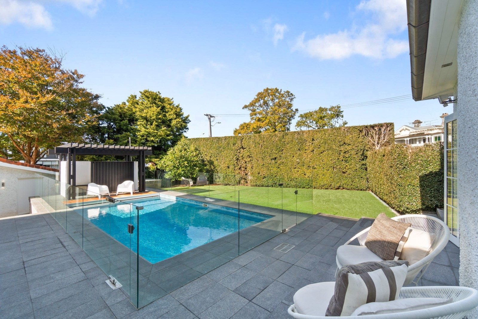 Outdoor entertaining area beside the completed Owens Road swimming pool