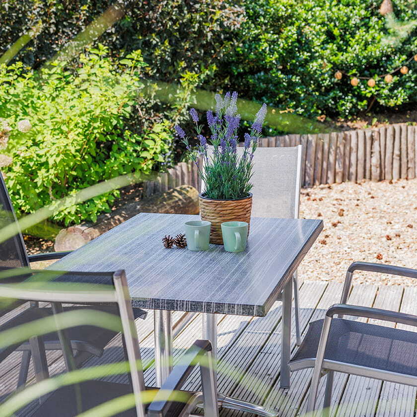 Veranda tussen de bomen