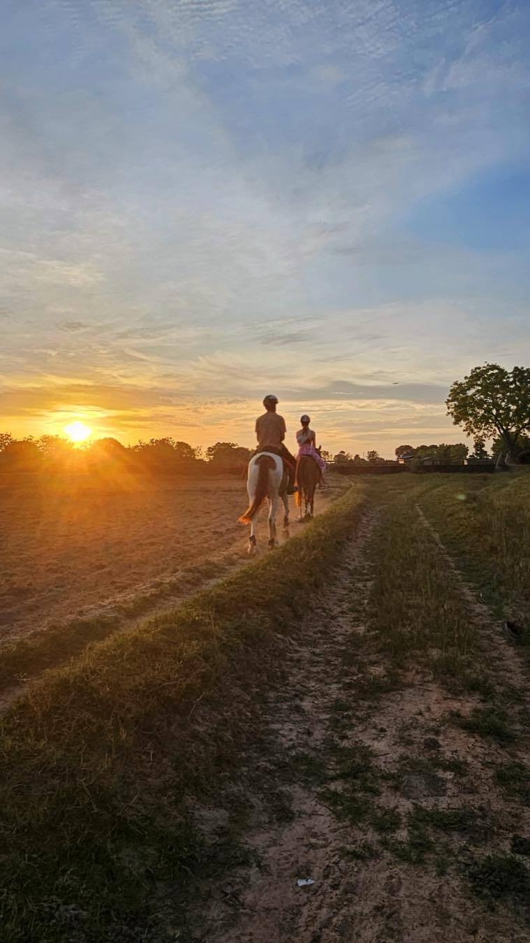 Riders moving at sunset during a low-volume Vonfidel Ranch riding holiday in Sri Lanka