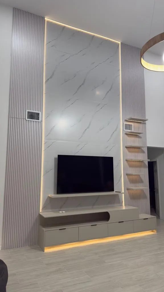 Accent media wall with marble-look panel, slat walls and LED backlight, Aventura FL