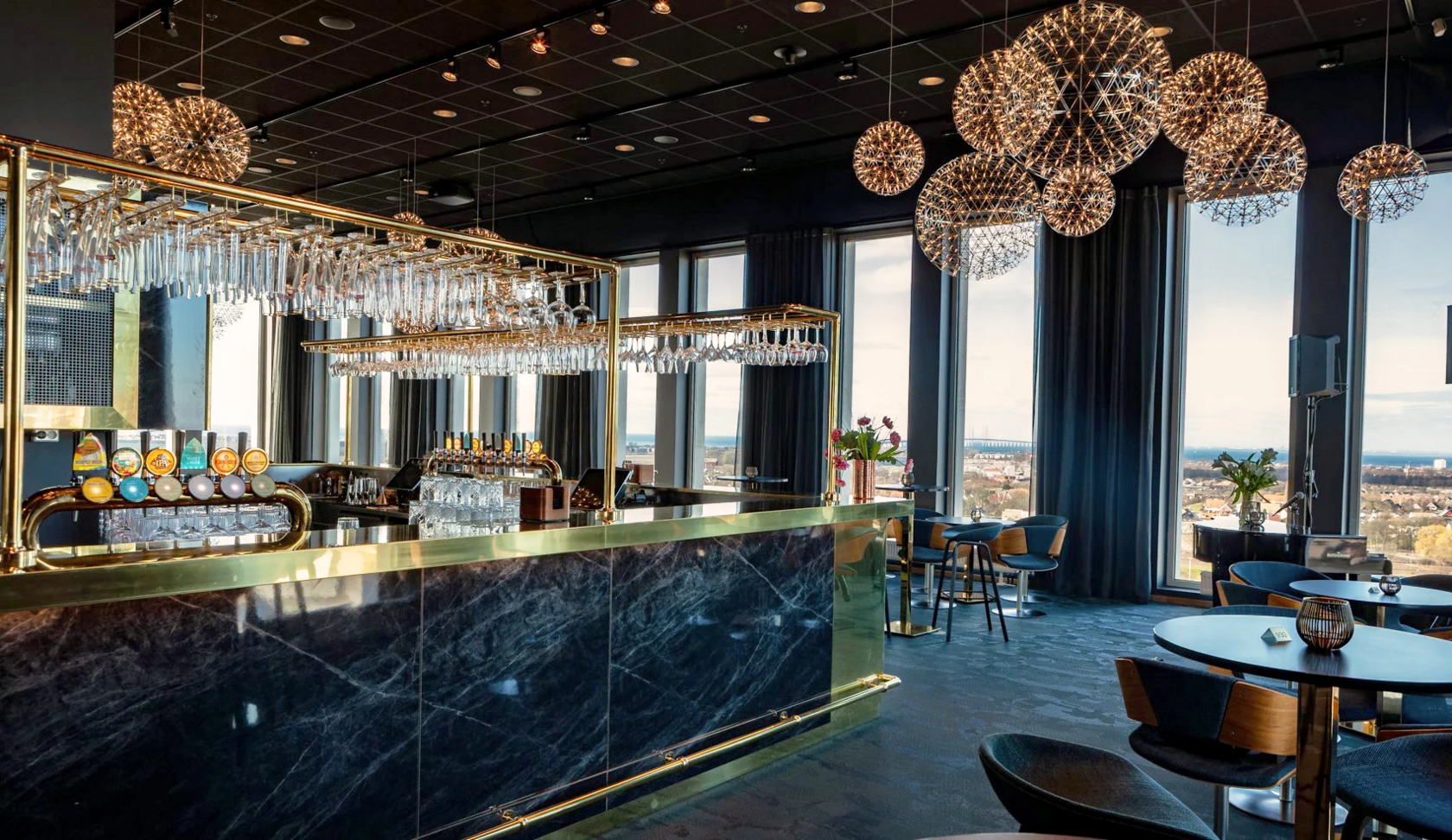 An awesome bar with wine glasses.