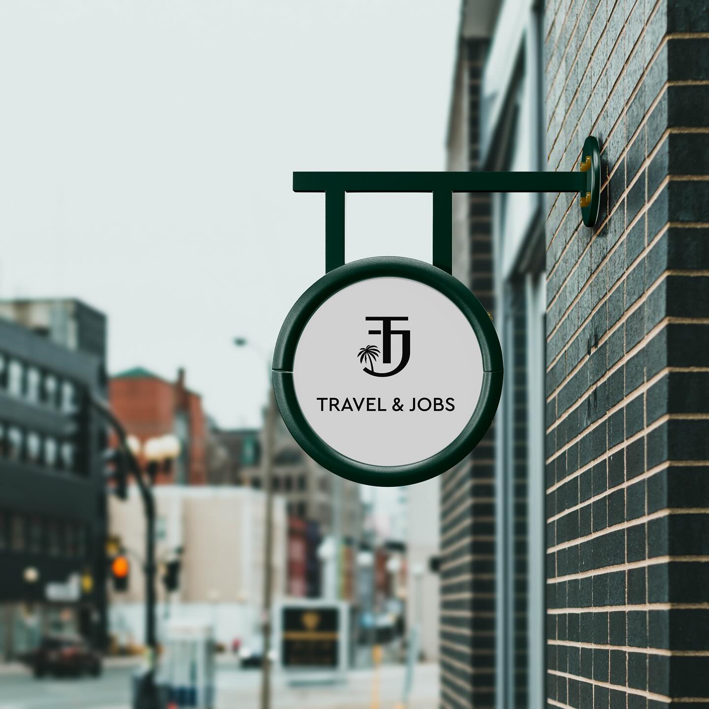 Round Travel & Jobs sign on a facade