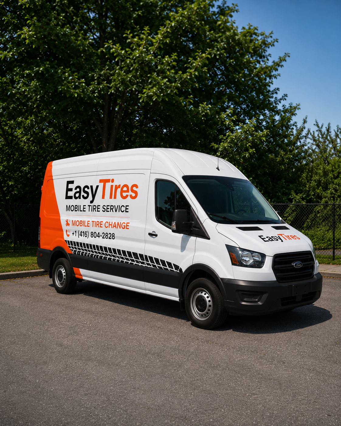 Mobile tire change technician swapping winter tires at a Toronto driveway