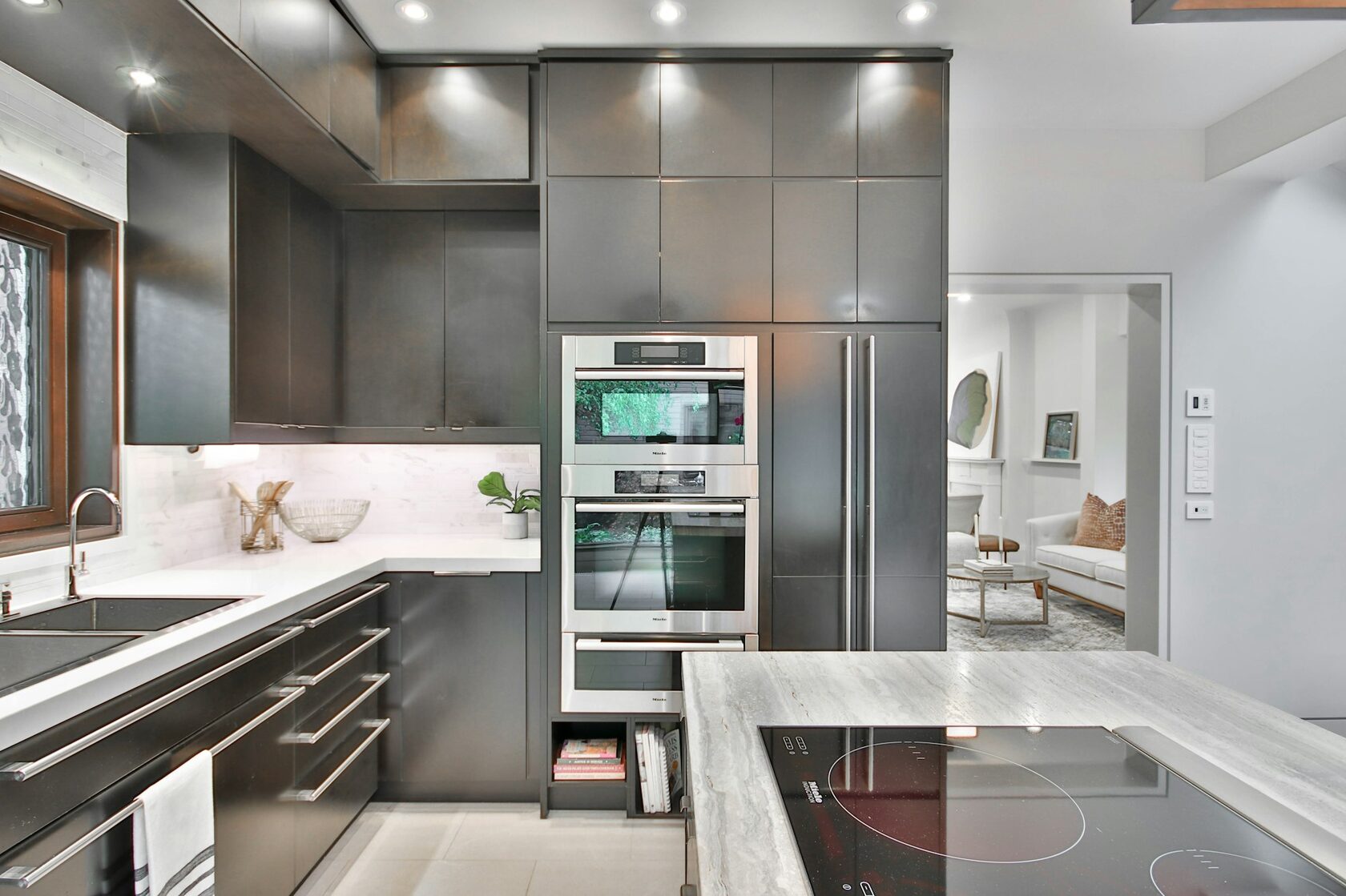 The Pointe kitchen with stainless appliances and stone counters