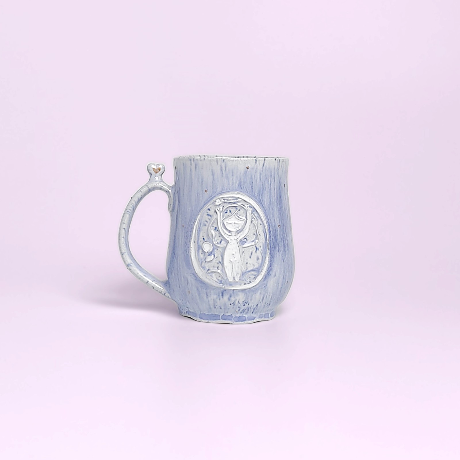 delicate blue handmade tea set — teapot, cups and saucers with carved forest fairy medallions