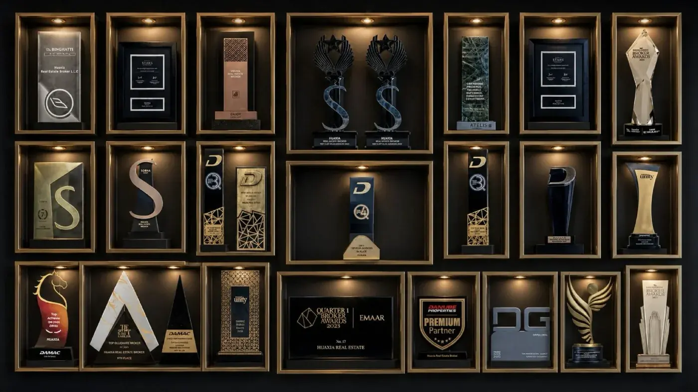 Huaxia Real Estate award wall — Dubai developer trophies and recognitions