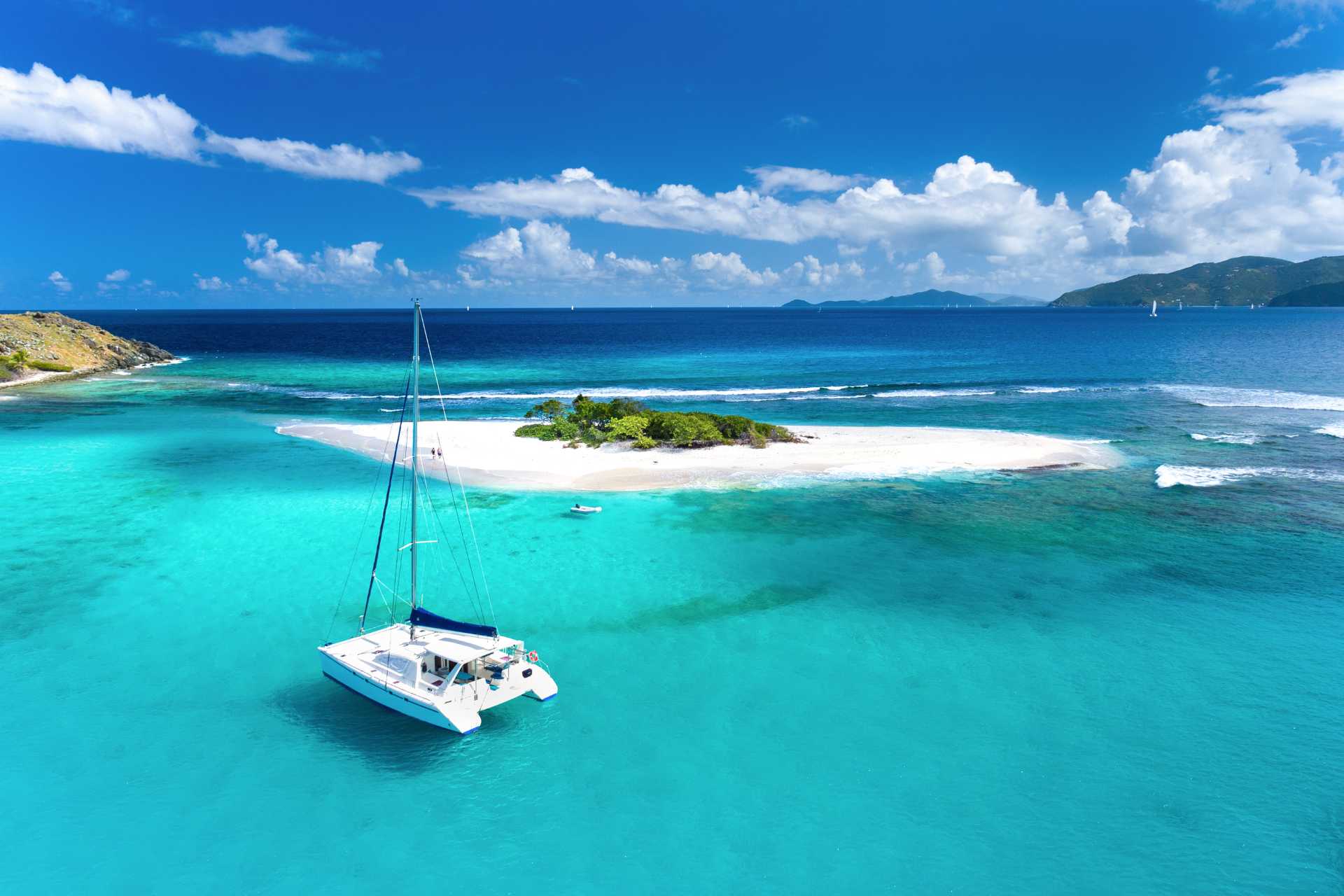 Catamaran at anchor in turquoise water in the British Virgin Islands