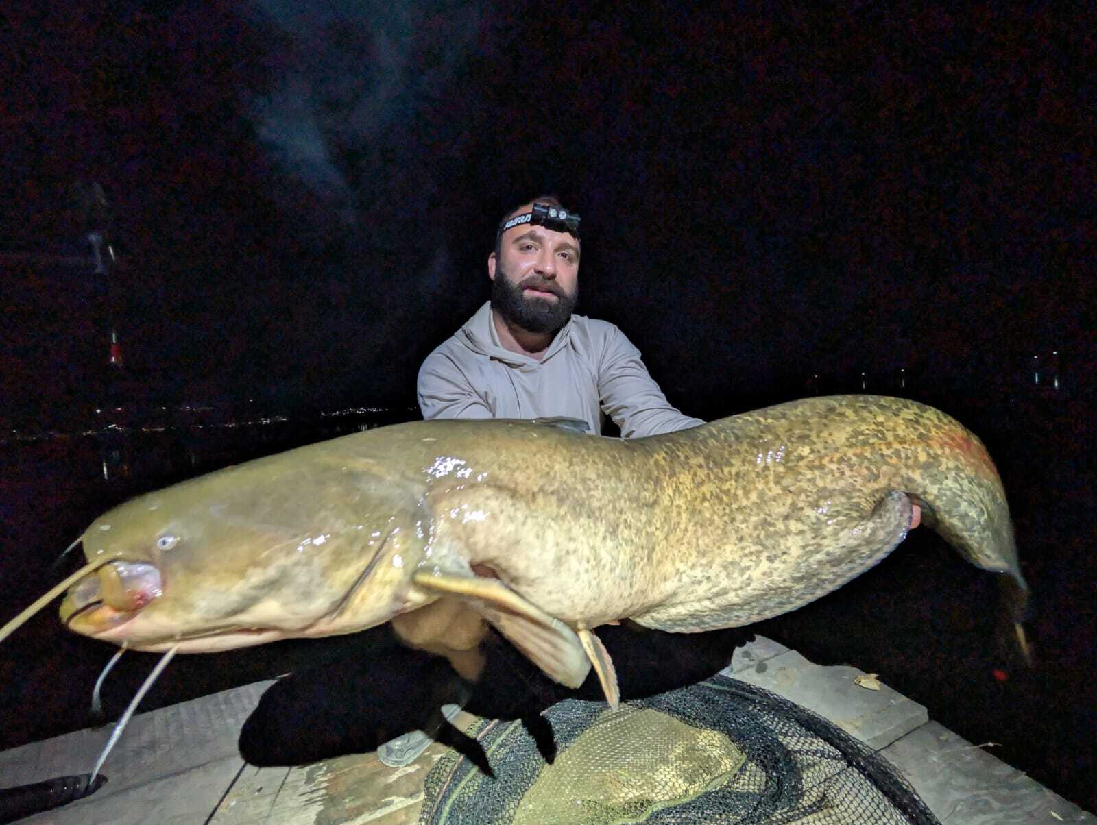 Nodo Sadunishvili with a 25 kg (55 lb) carp landed on Katran Crypton Symbios fishing line