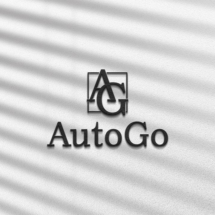 Чорний логотип AutoGo на білій стіні