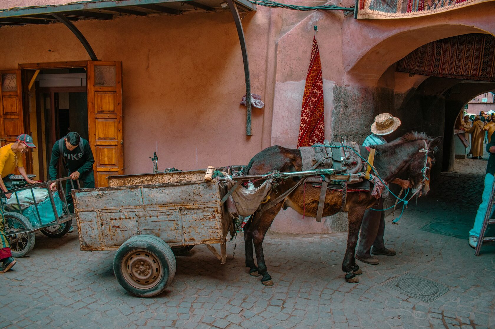 Market stalls and the Atlas Mountains in Marrakech