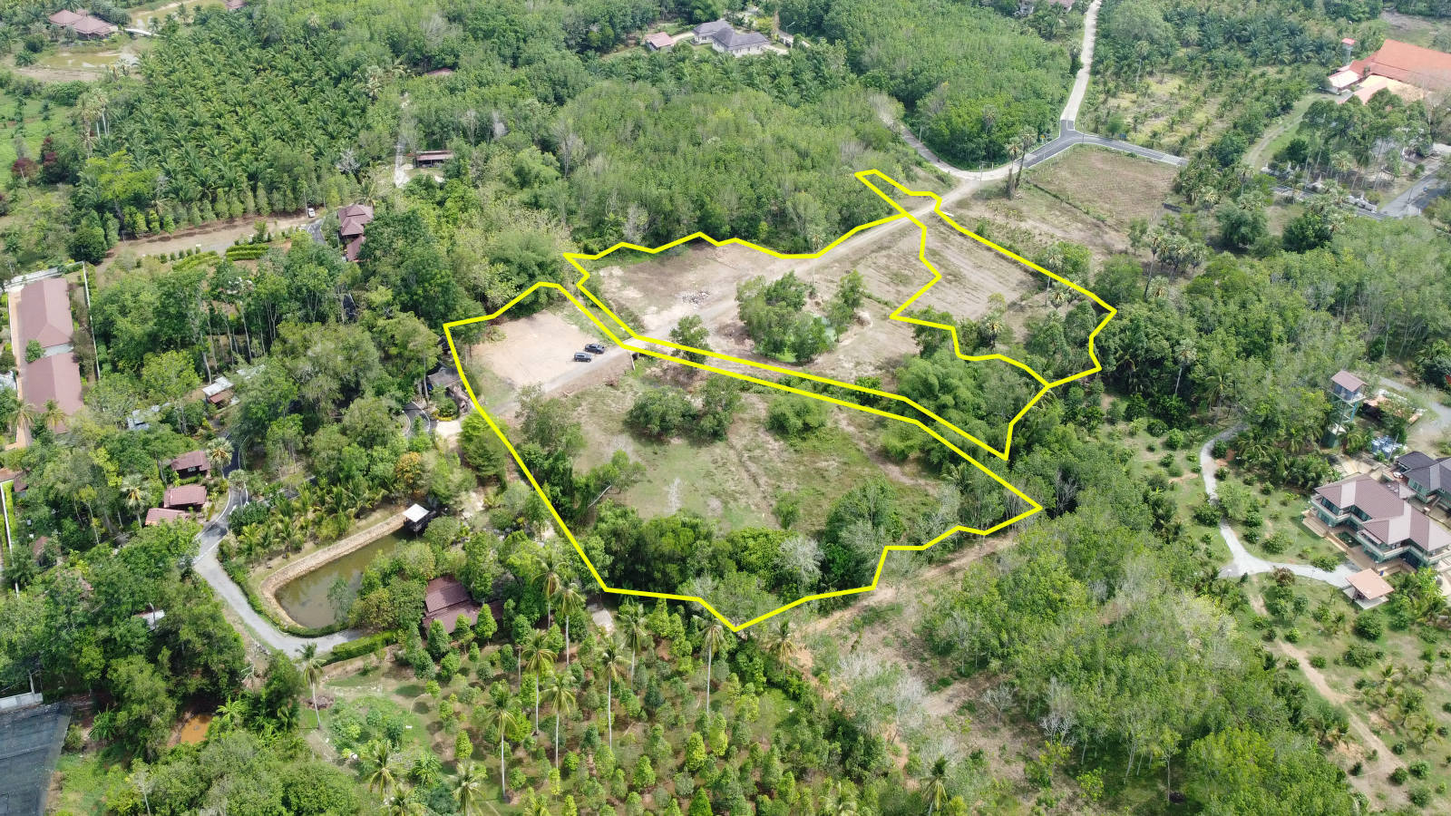 Surrounding context, 12.75 rai plot near Natai Beach