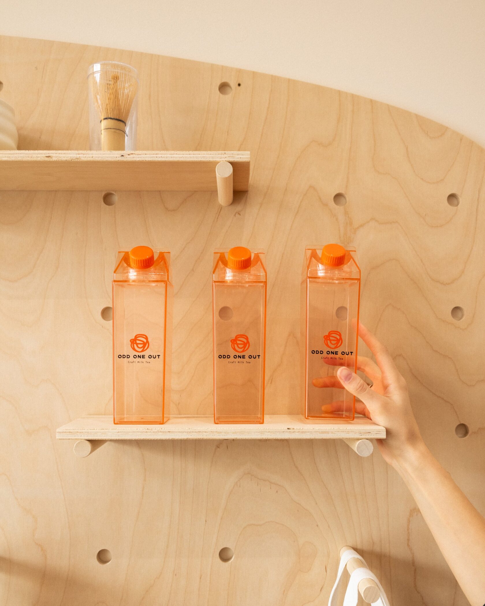Odd One Out bottles merch