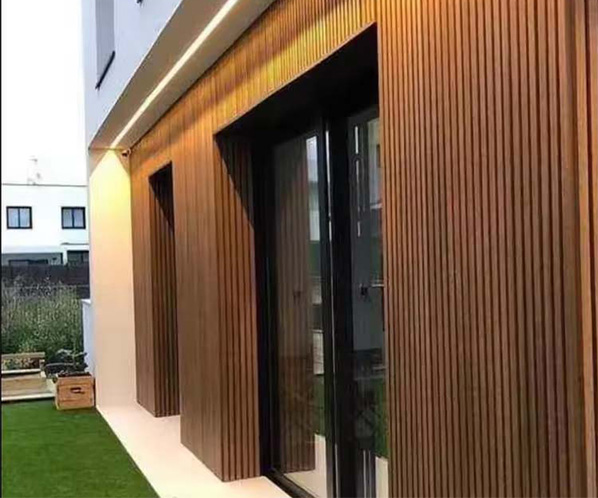 Modern house exterior with vertical wood cladding