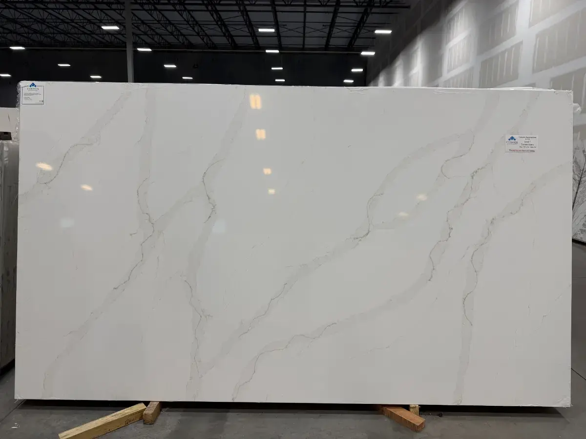 Calacatta Supreme Gold Kitchen Countertops and Sienna Silver Vanity for Mac Kuhl
